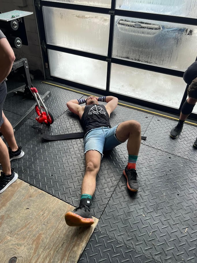 Alex standing with a playful pose